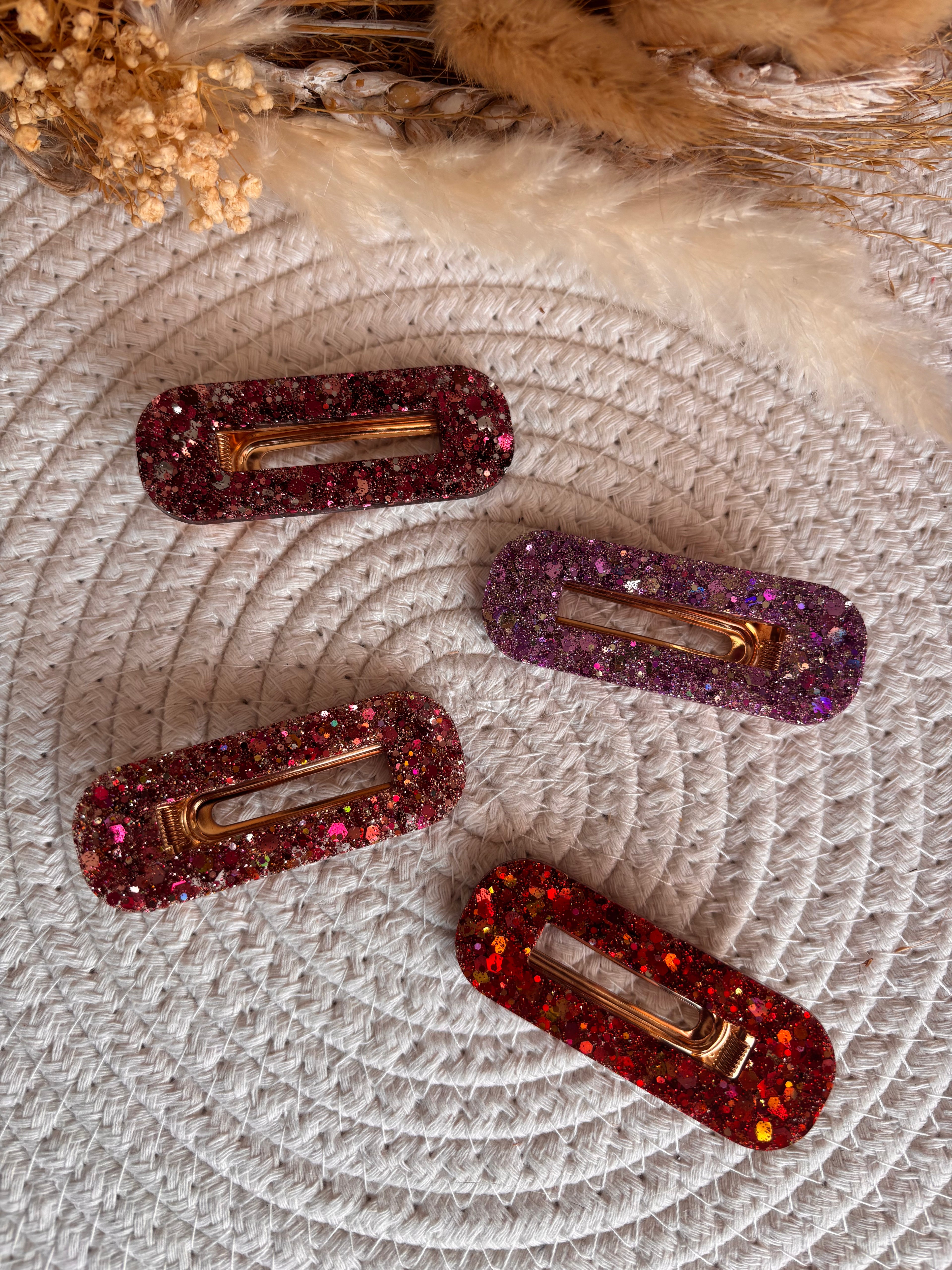 Barrettes en résine pailletée