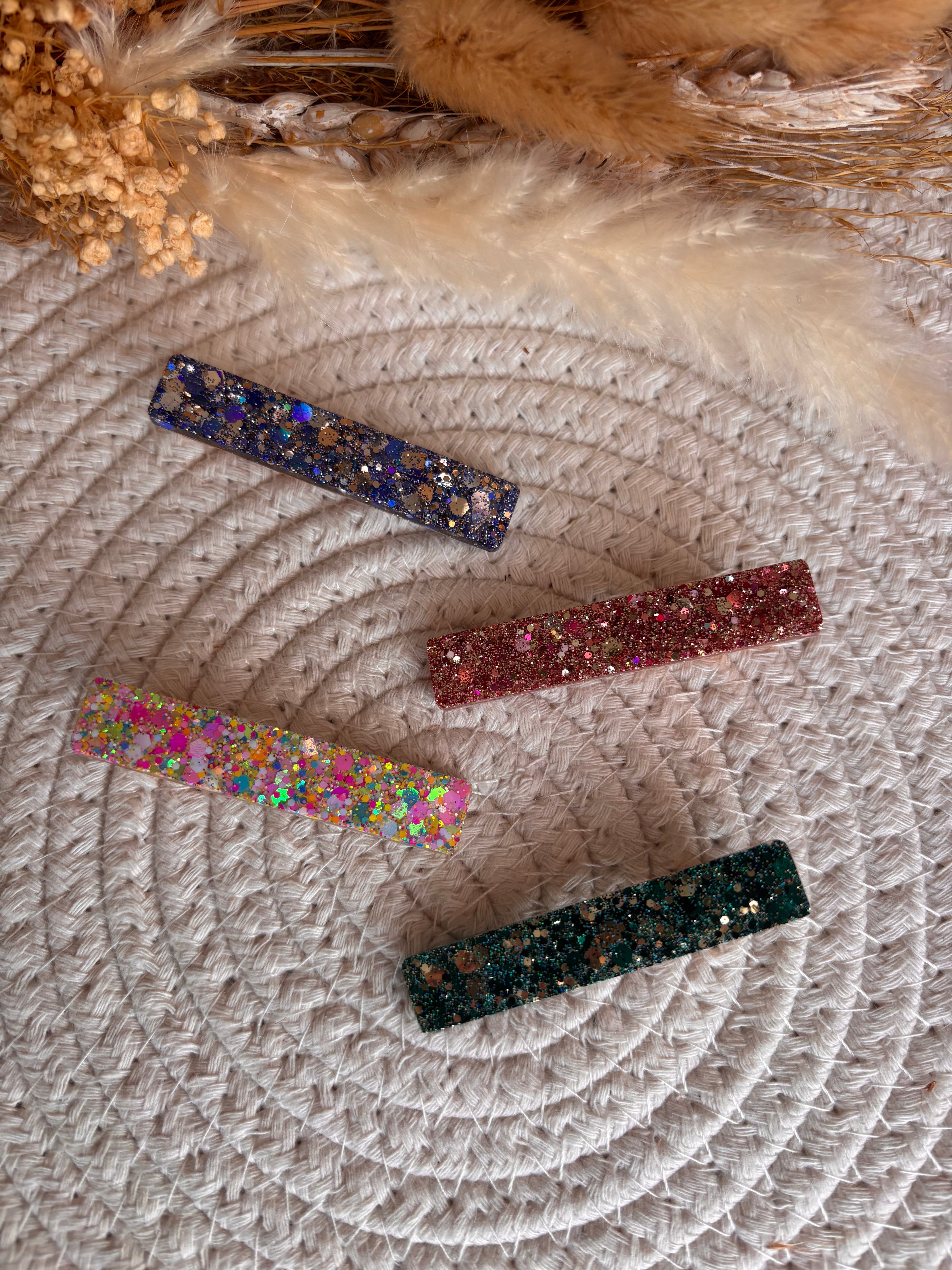 Barrettes en résine pailletée